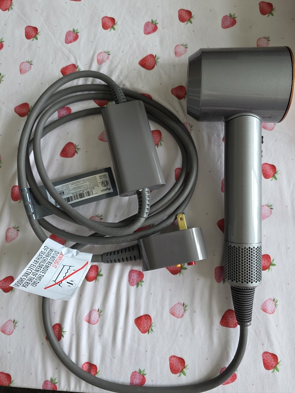 Dyson Copper and Nickel hair dryer with pink travel case and 5 attachments - Picture 2 of 4